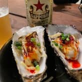 呉市の殻付牡蠣にチーズと自家製辣油をお好みで美味しくどうぞ