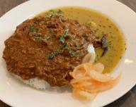 手ほぐしチキンとお豆カレーの合いがけ+超辛70円