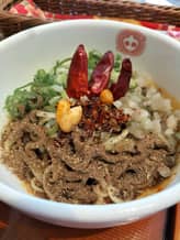 麻辣・汁なし担々麺 もっともっと辛く+温泉卵トッピング
